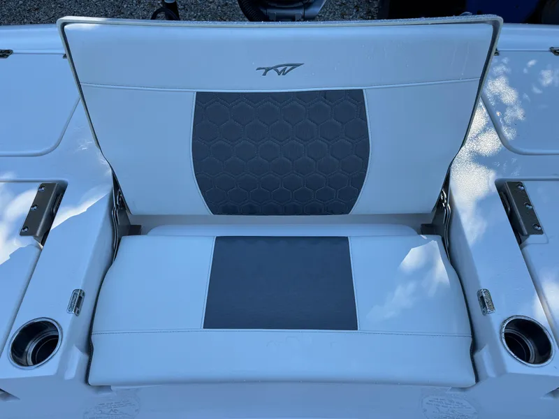Slide: The Image of Tidewater 2500 Carolina Bay 2020 boat seat with cup holders and stylish upholstery. - 15