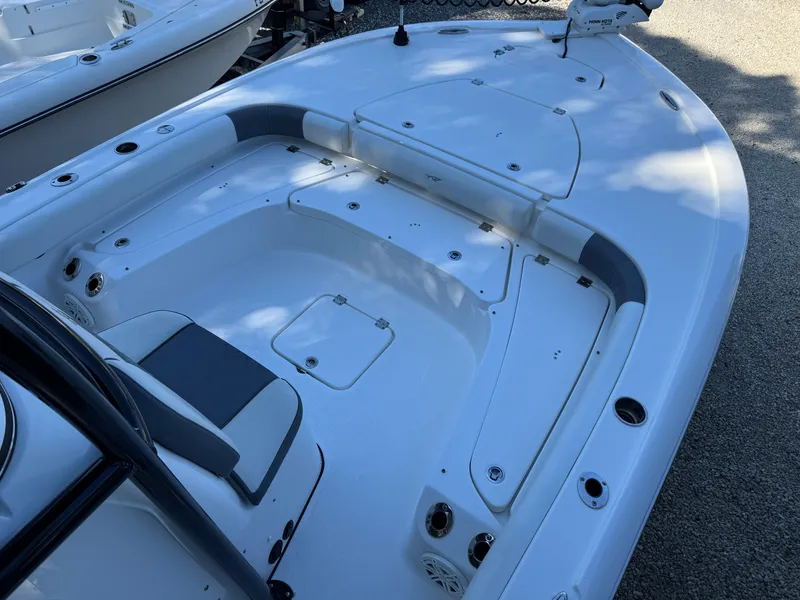 Slide: The Image of 2020 Tidewater 2500 Carolina Bay boat, spacious deck, white finish, modern design. - 20