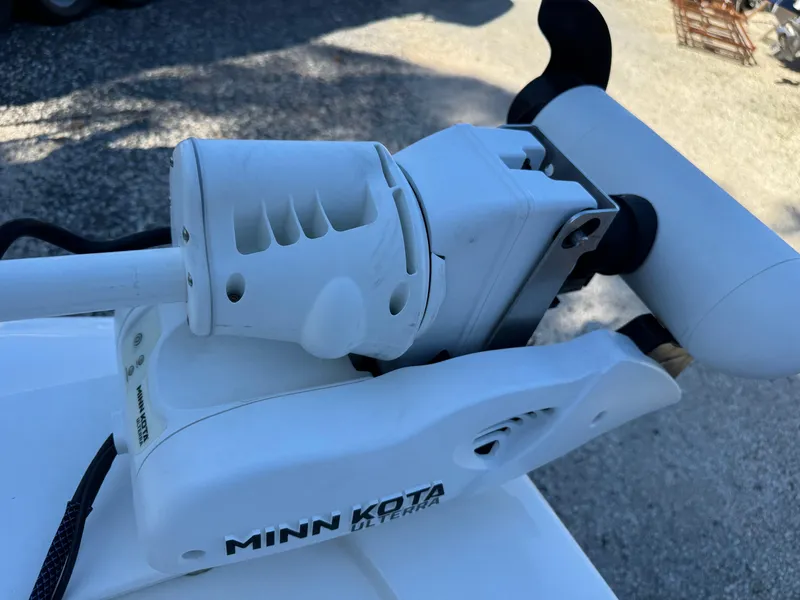 Slide: The Image of Minn Kota trolling motor on 2020 Tidewater 2500 Carolina Bay boat. - 24