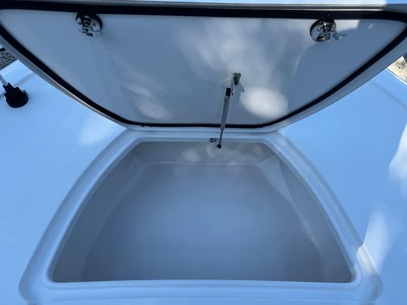 Slide: The Image of Open storage compartment on 2020 Tidewater 2500 Carolina Bay boat. - 26