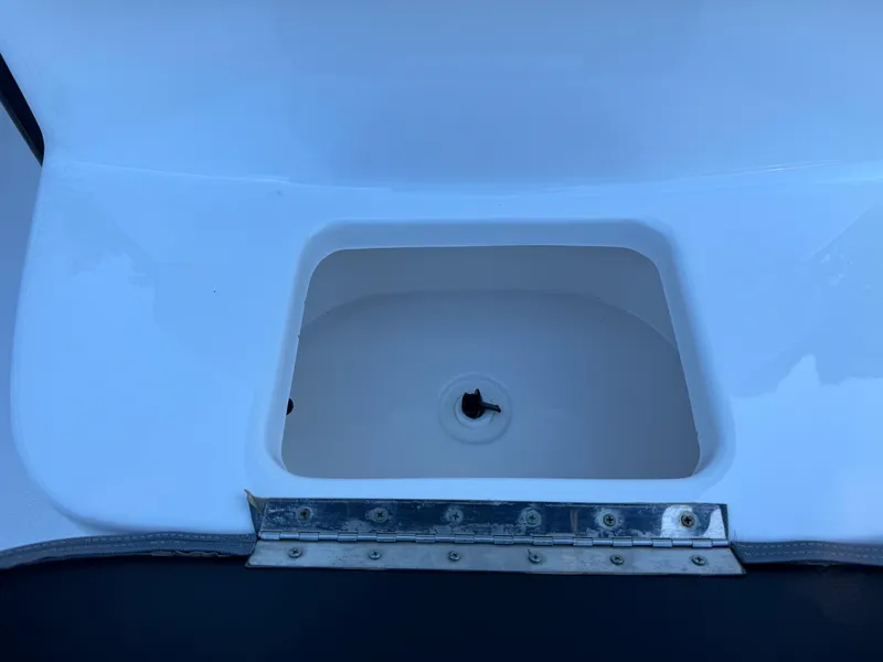Slide: The Image of Open storage compartment on 2020 Tidewater 2500 Carolina Bay boat. - 32