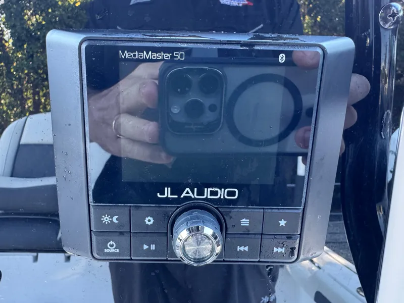 Slide: The Image of JL Audio MediaMaster 50 on 2020 Tidewater 2500 Carolina Bay boat dashboard. - 39