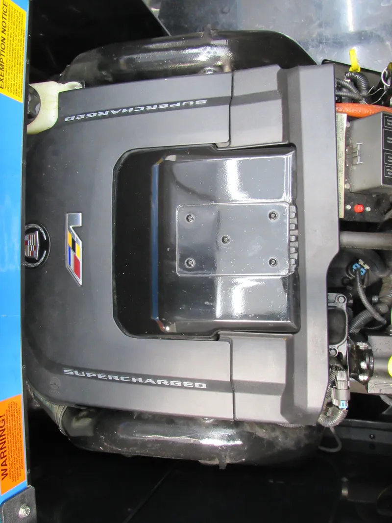 Slide: The Image of Supercharged engine of a 2012 Malibu Wakesetter 22 MXZ boat. - 14