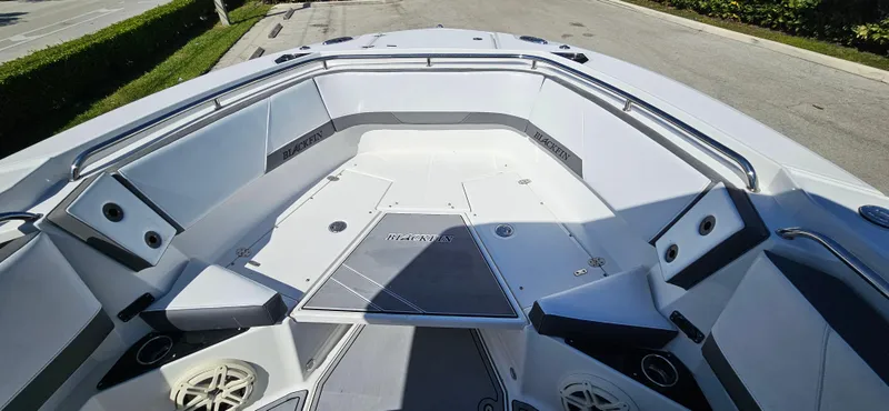 Slide: The Image of 2020 Blackfin 272 CC boat interior with spacious seating and modern design. - 10