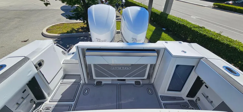 Slide: The Image of 2020 Blackfin 272 CC boat deck with dual engines and modern design. - 15