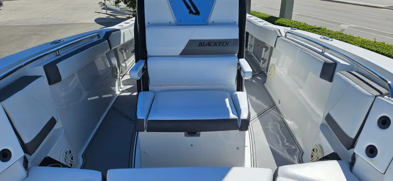 Slide: The Image of 2020 Blackfin 272 CC boat interior with seating and sleek design. - 17