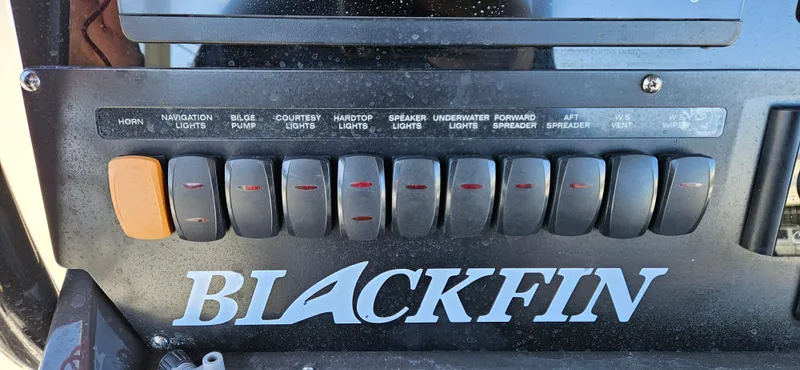 Slide: The Image of Control panel of a 2020 Blackfin 272 CC boat with labeled switches. - 28