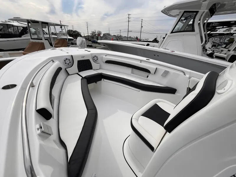 Slide: The Image of 2025 Tidewater 232 LXF boat interior with sleek seating and modern design. - 11