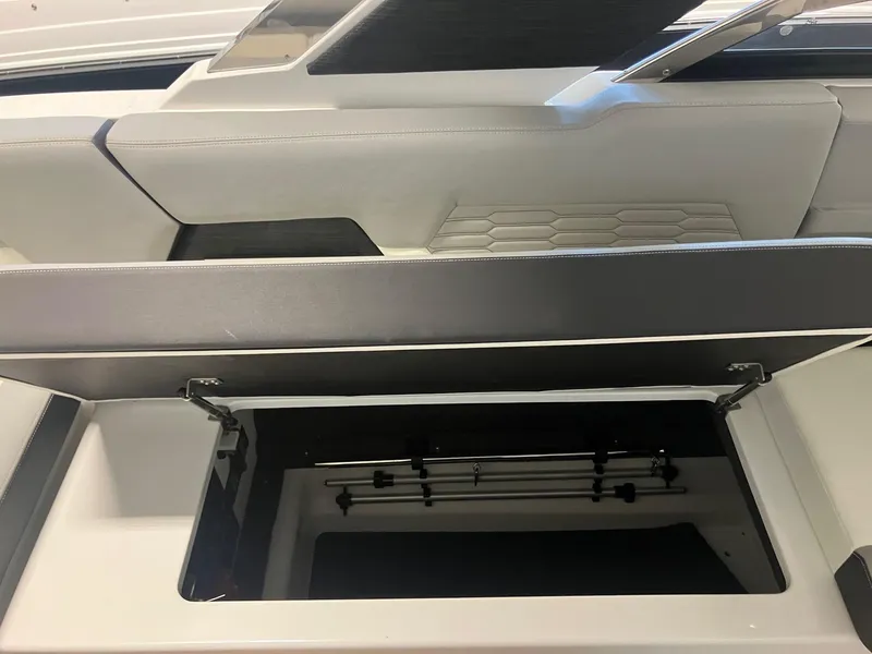 Slide: The Image of 2025 Cobalt A29 boat interior storage compartment with sleek design and modern features. - 4
