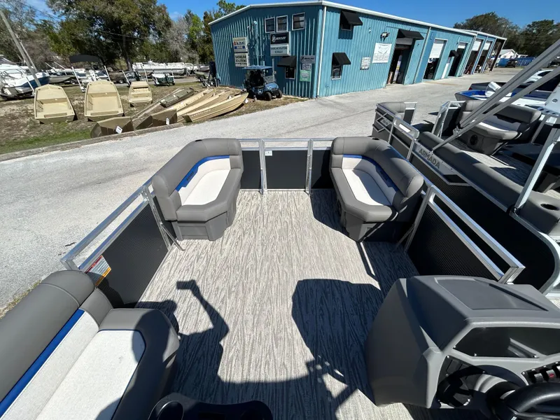 Slide: The Image of 2025 Armada Zen Z 168 boat interior with gray seating and modern design. - 10