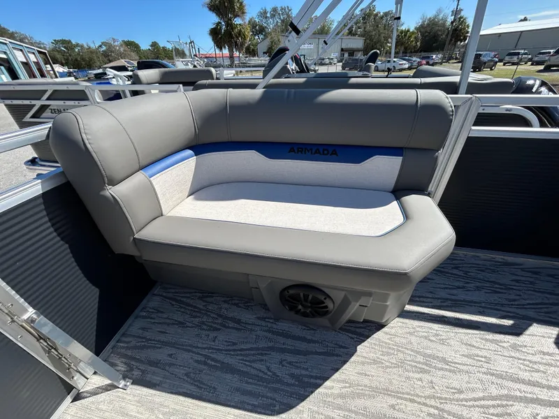 Slide: The Image of 2025 Armada Zen Z 168 boat interior with gray seating and speaker. - 4