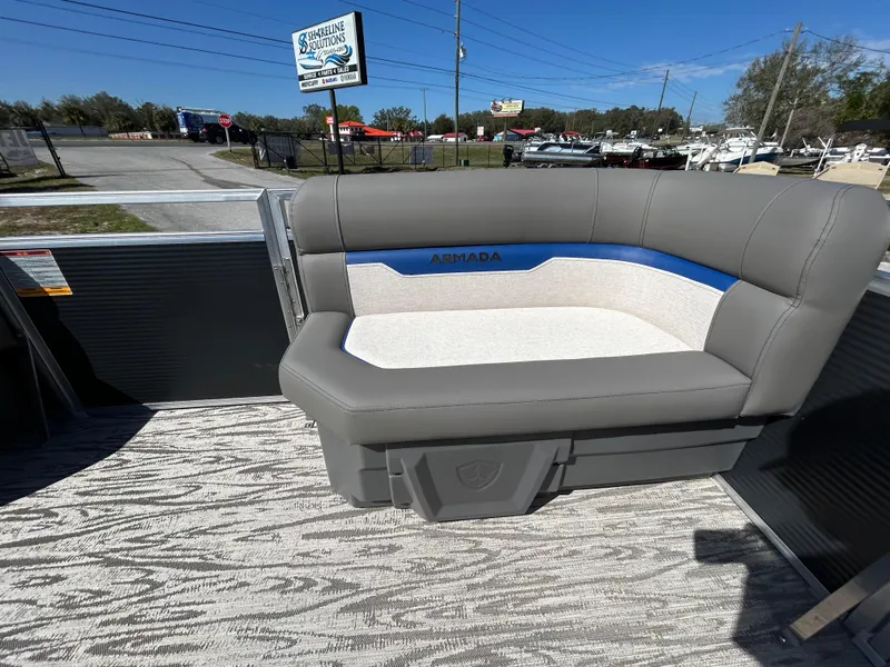 Slide: The Image of Armada Zen Z 168 boat seating, 2025 model, featuring gray and blue upholstery. - 5