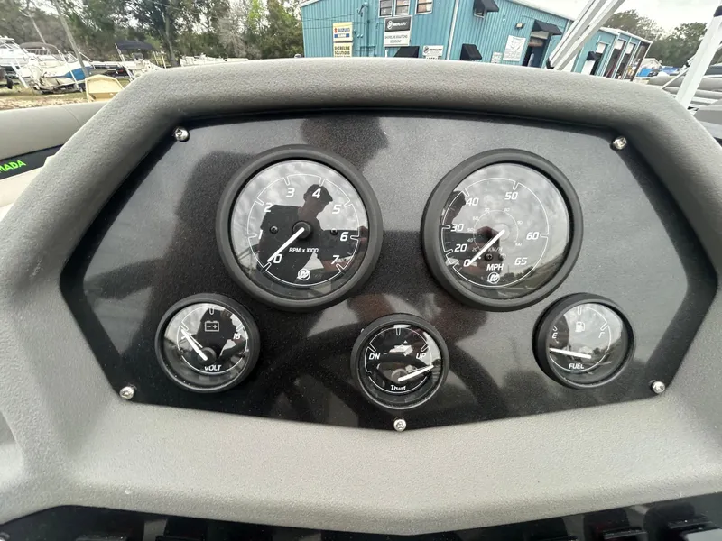 Slide: The Image of Dashboard of 2025 Armada Saphir 19SB boat with gauges and controls. - 16