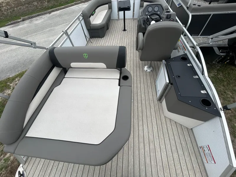 Slide: The Image of 2025 Armada Saphir 19SB boat interior with seating and control panel. - 5