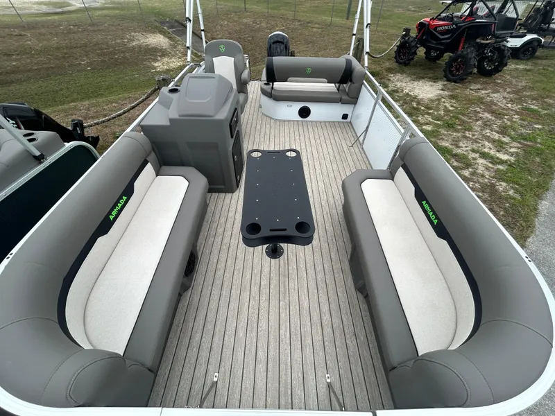 Slide: The Image of 2025 Armada Saphir 19SB pontoon boat interior with seating and table. - 9