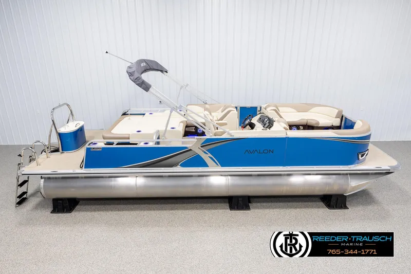 Slide: The Image of 2025 Avalon LSZ VRB pontoon boat with blue accents and modern design. - 1