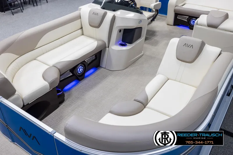 Slide: The Image of 2025 Avalon LSZ VRB boat interior with plush seating and ambient blue lighting. - 10