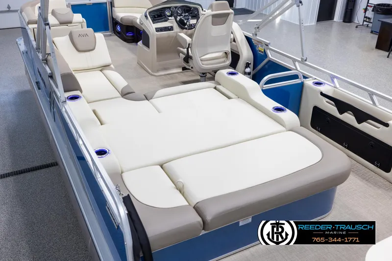 Slide: The Image of 2025 Avalon LSZ VRB boat interior with luxurious seating and modern dashboard. - 11