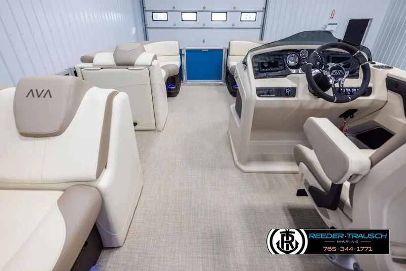 Slide: The Image of Interior of 2025 Avalon LSZ VRB boat with luxurious seating and modern dashboard. - 17