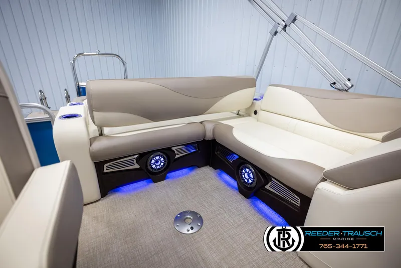 Slide: The Image of 2025 Avalon LSZ VRB boat interior with modern seating and blue LED lighting. - 27