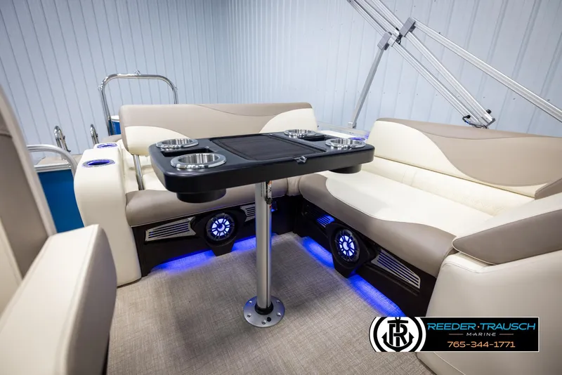 Slide: The Image of Luxurious interior of 2025 Avalon LSZ VRB pontoon with seating and table. - 28