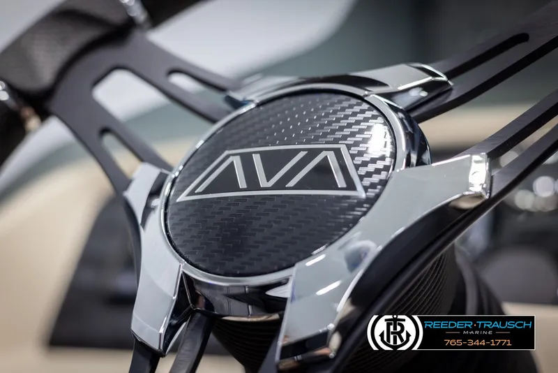 Slide: The Image of Steering wheel of 2025 Avalon LSZ VRB with carbon fiber detail and chrome accents. - 31