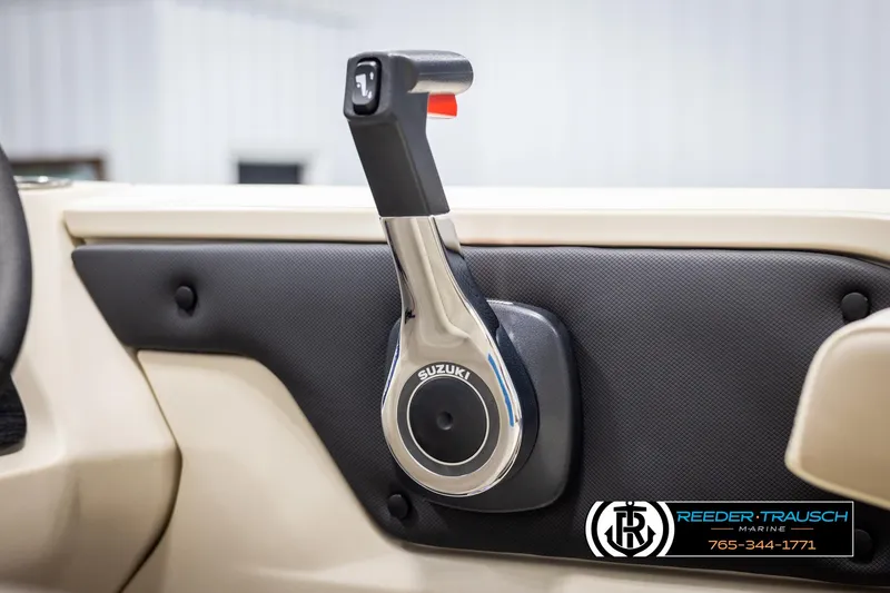 Slide: The Image of Avalon LSZ VRB 2025 boat throttle control with Suzuki branding, featuring sleek design. - 37
