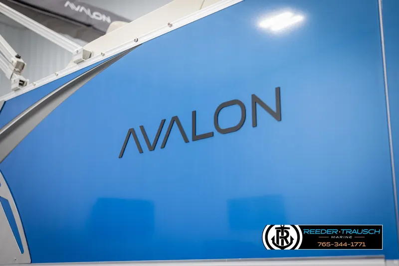 Slide: The Image of 2025 Avalon LSZ VRB boat with sleek blue design and branding. - 49