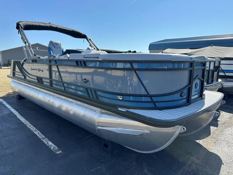 Slide: The Image of 2025 South Bay 523 ULE pontoon boat with sleek design and modern features. - 2