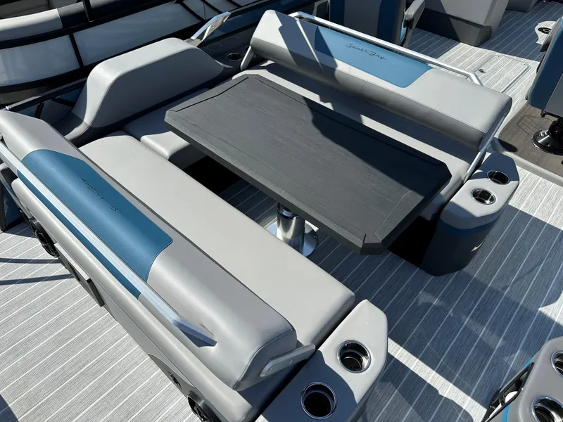 Slide: The Image of 2025 South Bay 523 ULE boat interior with seating and table. - 5