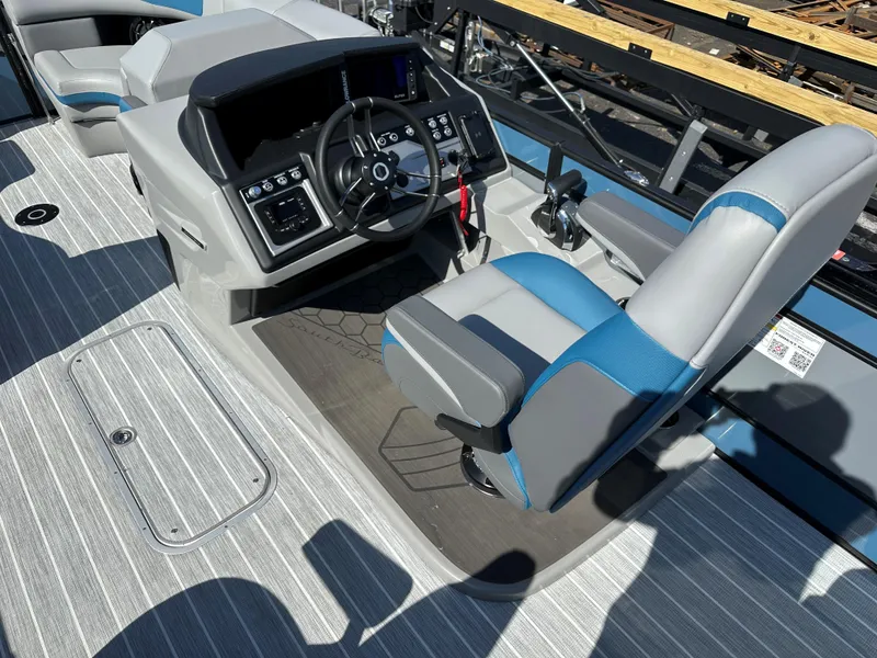 Slide: The Image of 2025 South Bay 523 ULE boat cockpit with modern steering and controls. - 6