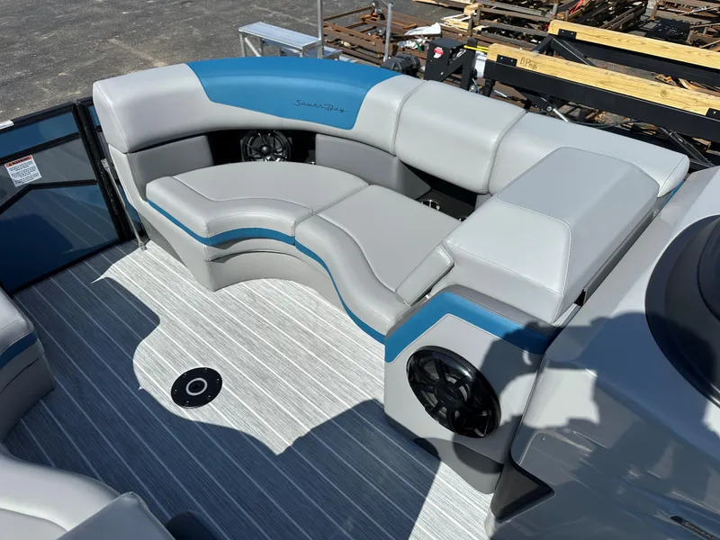 Slide: The Image of Luxurious seating on 2025 South Bay 523 ULE pontoon boat with modern design and speakers. - 9