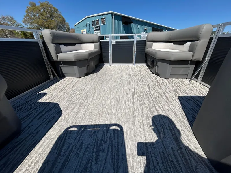 Slide: The Image of Interior of 2025 Armada Z-168 boat with gray seating and textured flooring. - 13