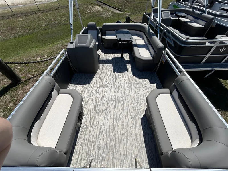 Slide: The Image of Spacious seating on 2025 Armada Z-168 pontoon boat, featuring modern design and comfortable upholstery. - 3