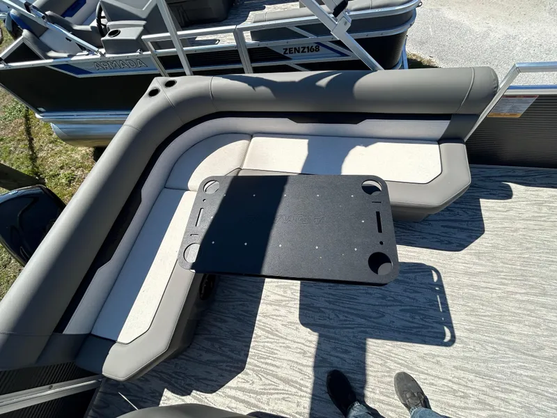 Slide: The Image of Armada Z-168 2025 boat interior with cushioned seating and table. - 7
