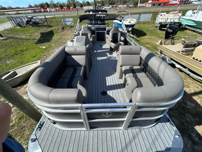 Slide: The Image of 2025 Armada Drakkar 23QL pontoon boat with spacious seating and modern design. - 6