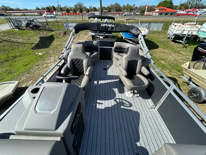 Slide: The Image of 2025 Armada Drakkar 23QL pontoon boat with spacious seating and modern design. - 8