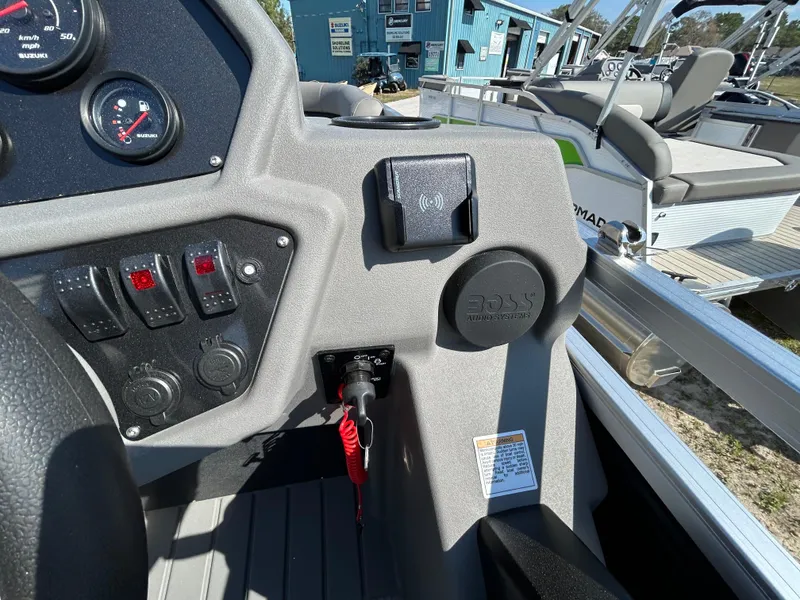 Slide: The Image of Control panel of 2025 Armada Saphir 21SB boat with switches and gauges. - 10