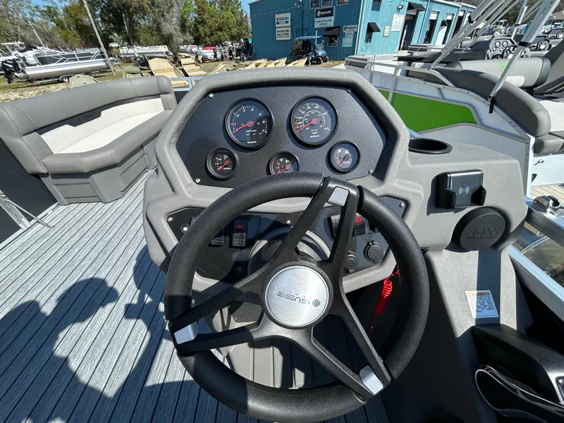 Slide: The Image of Steering console of 2025 Armada Saphir 21SB boat with gauges and controls. - 9