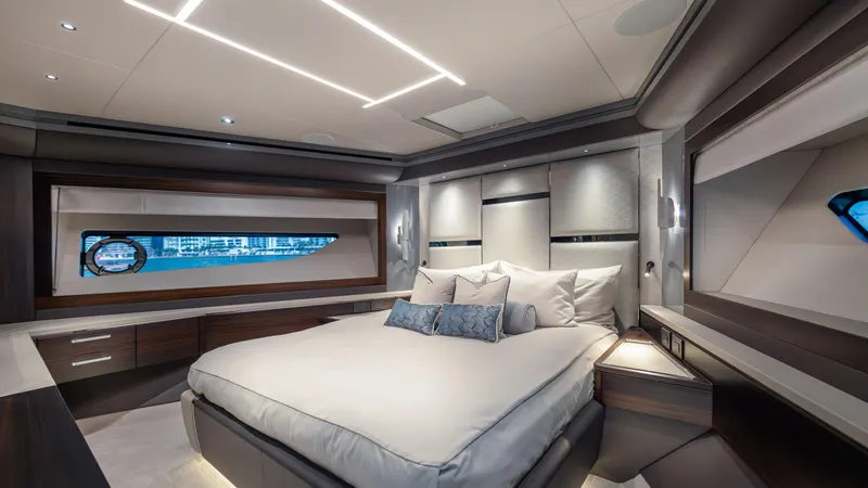 Slide: The Image of Luxurious bedroom interior of 2025 Sunseeker 88 Yacht, featuring modern design and elegant lighting. - 36
