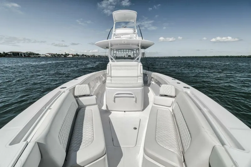 Slide: The Image of 2023 Jupiter 40 boat with spacious seating on open water. - 12