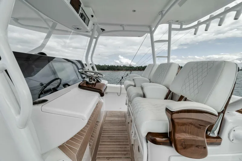 Slide: The Image of Luxurious interior of 2023 Jupiter 40 boat with plush seating and sleek design. - 27