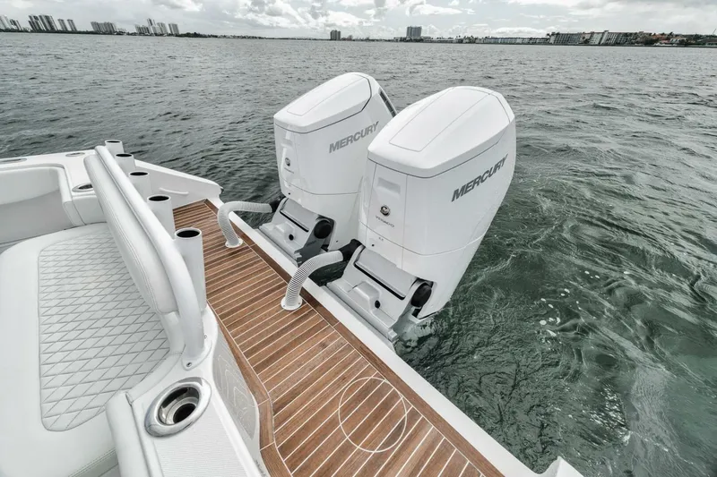 Slide: The Image of Jupiter 40 boat with dual Mercury outboard engines on water, 2023 model. - 33
