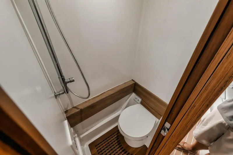 Slide: The Image of Compact bathroom with shower and toilet in 2023 Jupiter 40 model. - 46