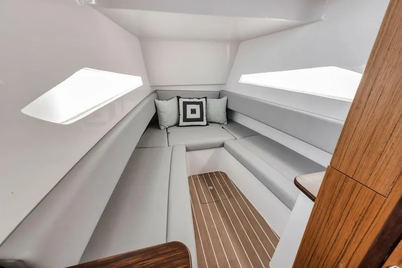 Slide: The Image of 2023 Jupiter 40 boat interior with sleek seating and modern design. - 48