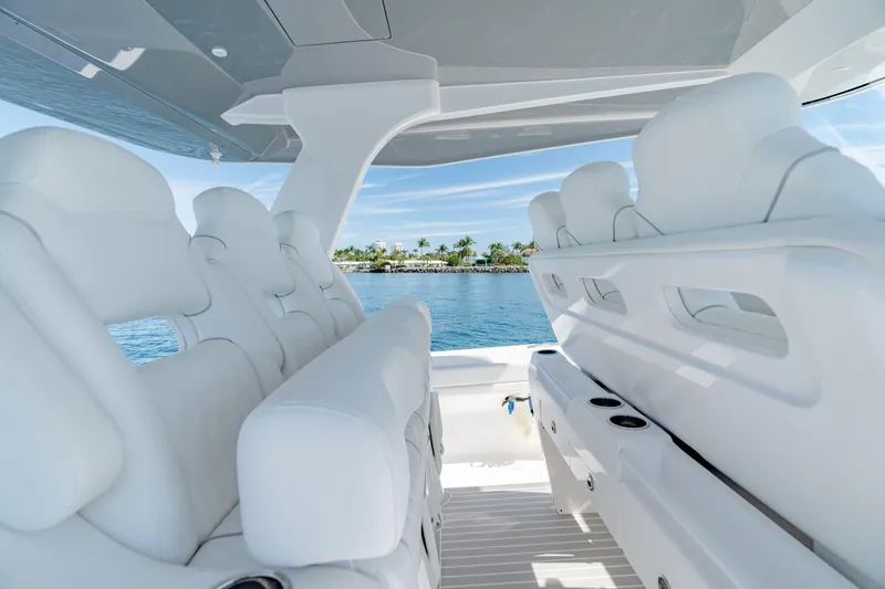 Slide: The Image of Luxurious interior of 2023 Intrepid 427 Nomad SE boat with white seating. - 10