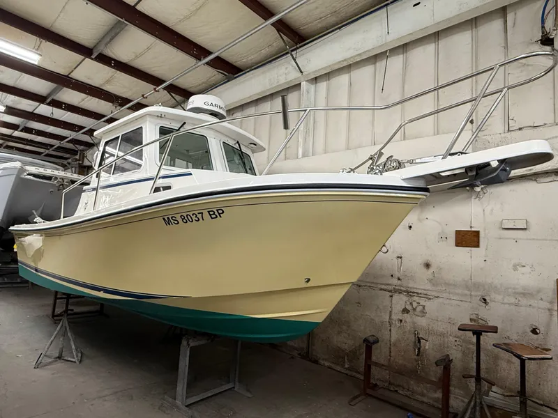 Slide: The Image of 2021 Steiger Craft 23DV Miami boat in a warehouse setting. - 1