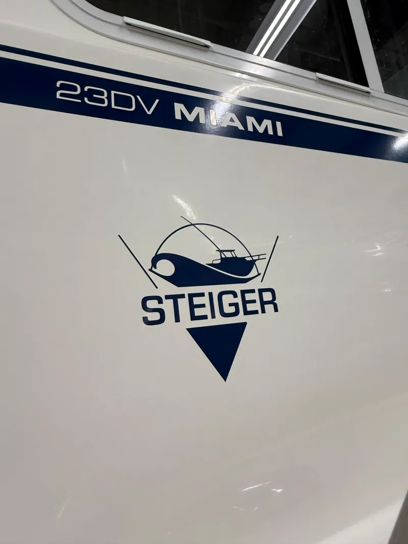 Slide: The Image of 2021 Steiger Craft 23DV Miami boat logo and model name on hull. - 21