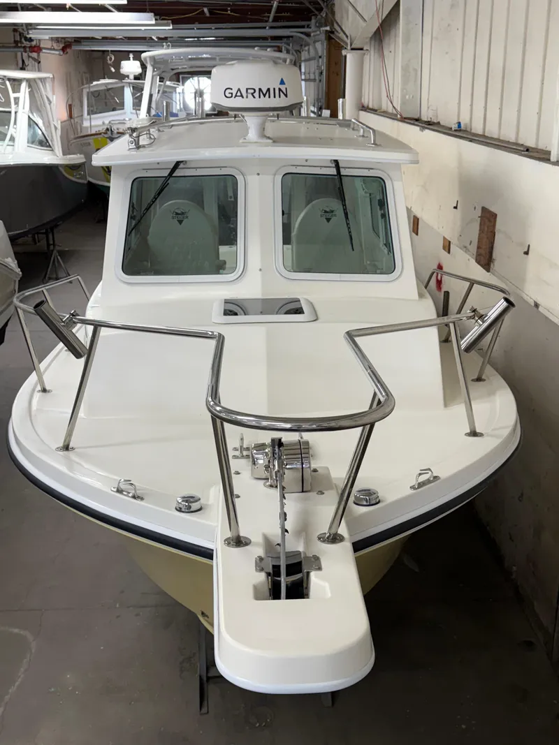 Slide: The Image of 2021 Steiger Craft 23DV Miami boat with Garmin equipment in a storage facility. - 3