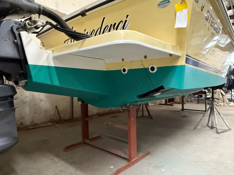 Slide: The Image of 2021 Steiger Craft 23DV Miami boat on stands in a workshop. - 7